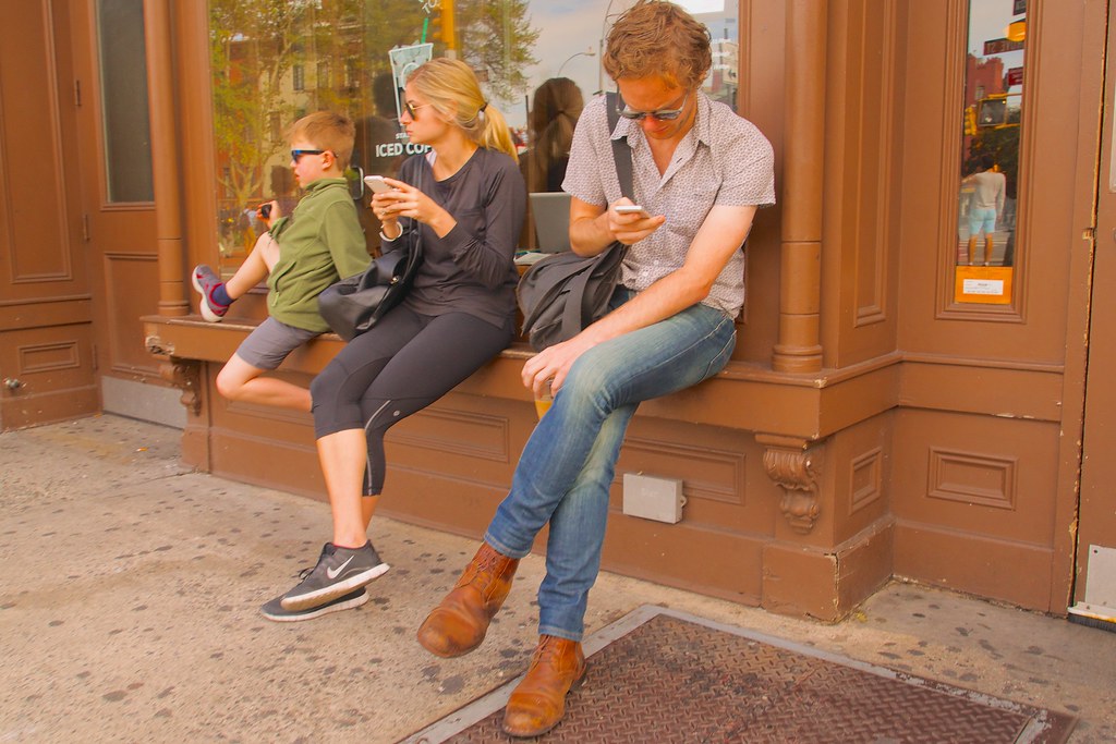 "New York parents are constantly looking at their cell phones. It drives their kids crazy" by Ed Yourdon is licensed under CC BY-NC-SA 2.0.